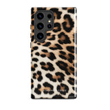 A tough phone case with a leopard print design is displayed. The dual-layer design features black and brown spots on a tan background, mimicking leopard fur. The text "Statement Cases" is printed on the lower part of the impact-resistant case. This is the Mighty Jaguar Fur for Samsung by Statement Cases.