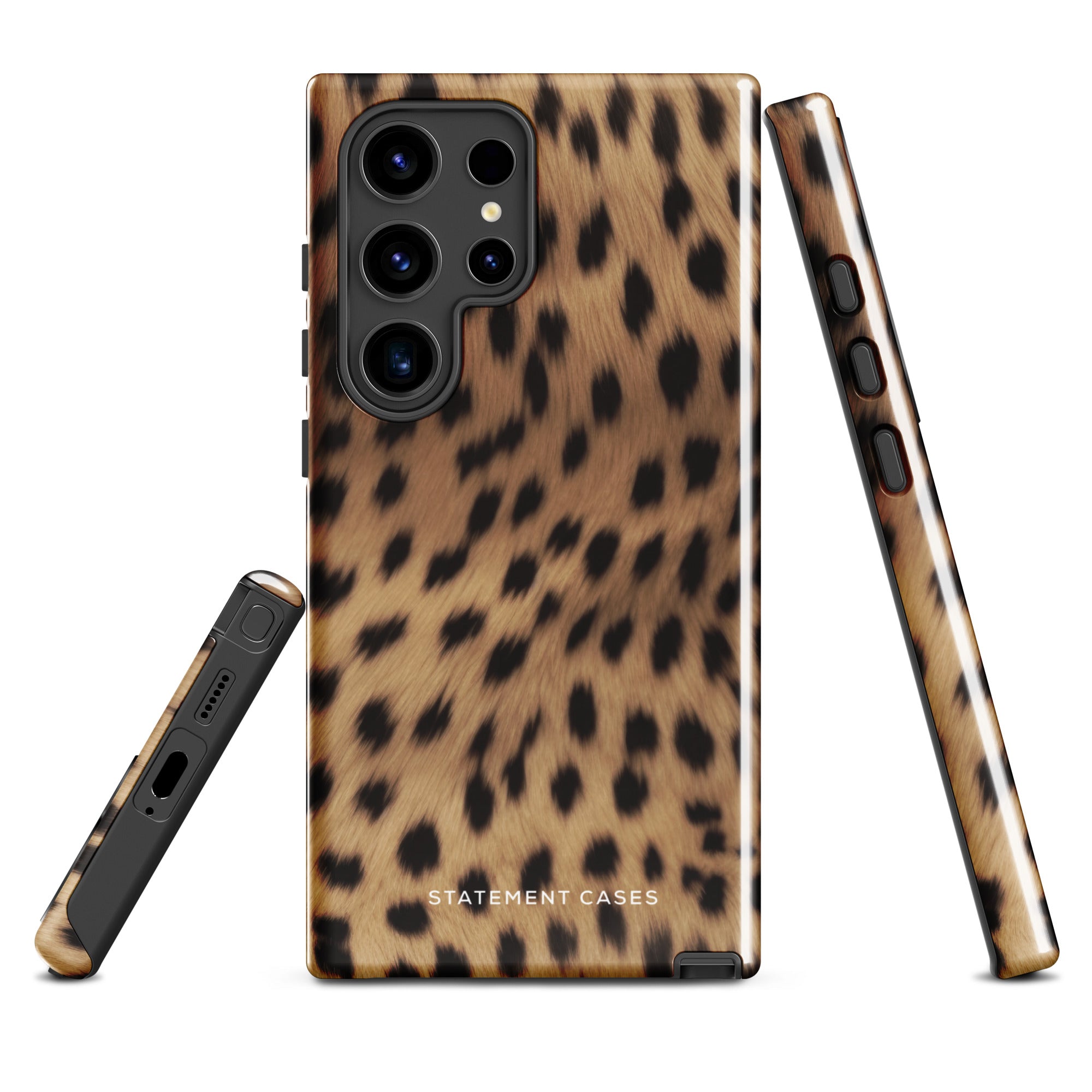 A smartphone with a leopard print, dual-layer design phone case featuring four camera lenses on the back is displayed against a white background. The bottom of the tough phone case has the brand name "Statement Cases" in white letters. The product name is "Daring Cheetah Fur for Samsung".