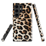 A tough phone case with a leopard print design is displayed. The dual-layer design features black and brown spots on a tan background, mimicking leopard fur. The text "Statement Cases" is printed on the lower part of the impact-resistant case. This is the Mighty Jaguar Fur for Samsung by Statement Cases.