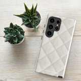 A Quilted Delight for Samsung with a quilted pattern in a light cream color made from impact-resistant materials. The case has a cutout for the camera module with four lenses and a flash. "Statement Cases" is branded at the bottom in white text.