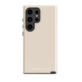 A beige smartphone case with vertical stripes designed for a phone with a triple camera setup. This impact-resistant phone case features precise cutouts for the cameras, buttons, and other essential functions. "Statement Cases" is printed at the bottom of the tough phone case. Product Name: Noble Pinstripe for Samsung