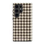 A Statement Cases Timeless Houndstooth for Samsung featuring a black and beige houndstooth pattern. The camera cutout at the top rear is designed for a triple-lens camera. With its dual-layer design and slim profile, this impact-resistant case also boasts a glossy finish.