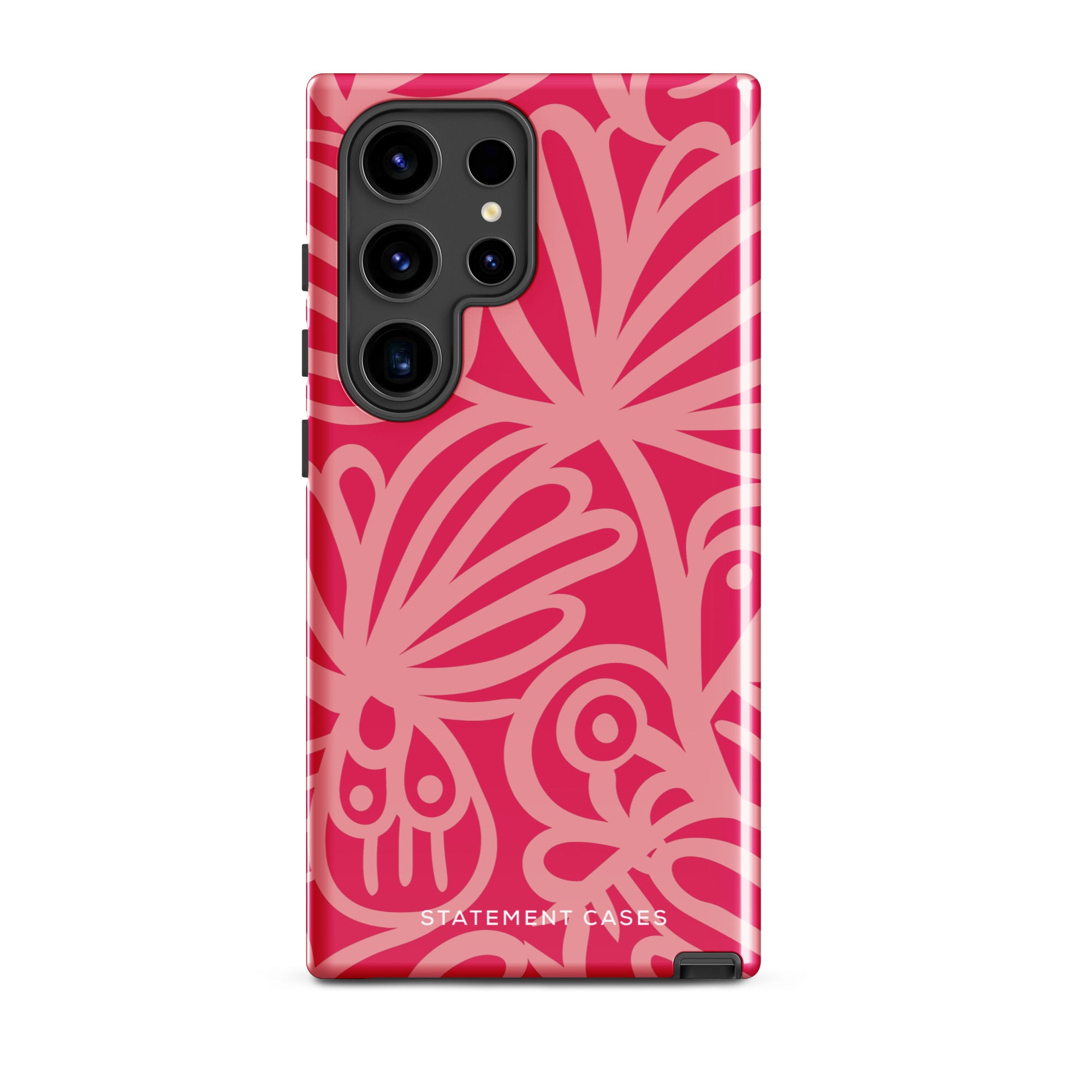 The Zafiro Rosa for Samsung, a smartphone from Statement Cases, comes with an impact-resistant pink floral-patterned case. The case showcases bold, abstract flower designs in various shades of pink and features the "STATEMENT CASES" text at the bottom. It also has a camera cutout that reveals multiple lenses, providing both style and protection.