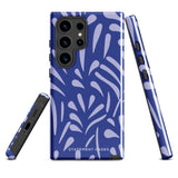 The Mariposa Azul for Samsung smartphone case from Statement Cases is adorned with an impact-resistant design featuring light purple abstract shapes on a blue background. This dual-layer case proudly displays the text "STATEMENT CASES" at the bottom, ensuring that the camera lenses and buttons of your phone remain clearly visible.