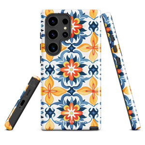 The Mediterranean Bloom for Samsung by Statement Cases features intricate, colorful floral patterns in blue, orange, and yellow. The design covers the entire back of the case, surrounding the camera cutout. Shock-absorbing and impact-resistant, it ensures protection while the brand "Statement Cases" is subtly printed near the bottom.